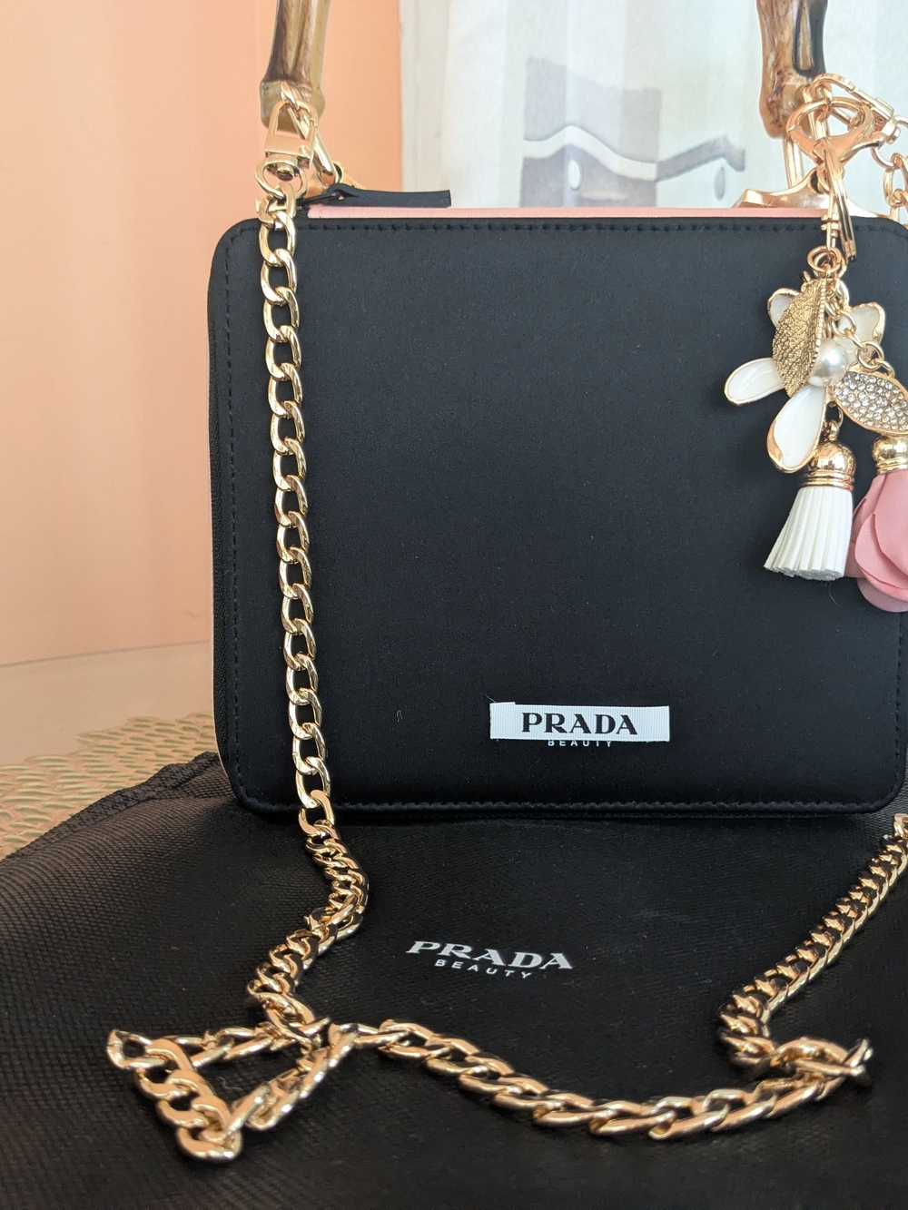 Prada Black Crossbody Bag with Bamboo Handle & Pink Flower Charm - Picture 2 of 9